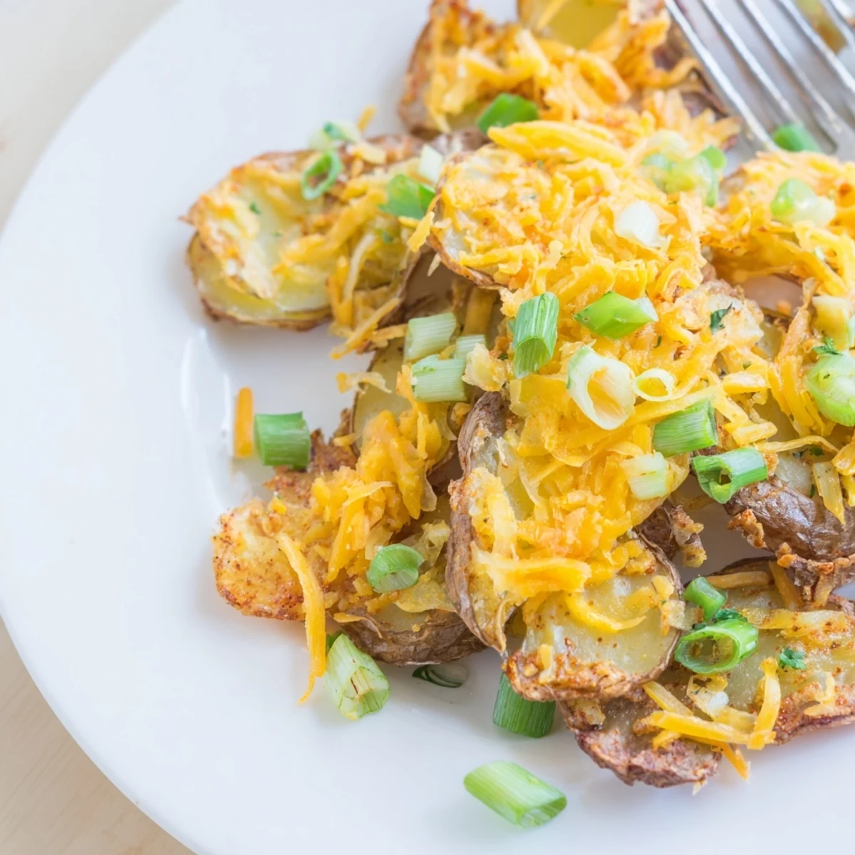 Savory smashed green onion potato bombs, cheesy, crunchy, and utterly delicious.