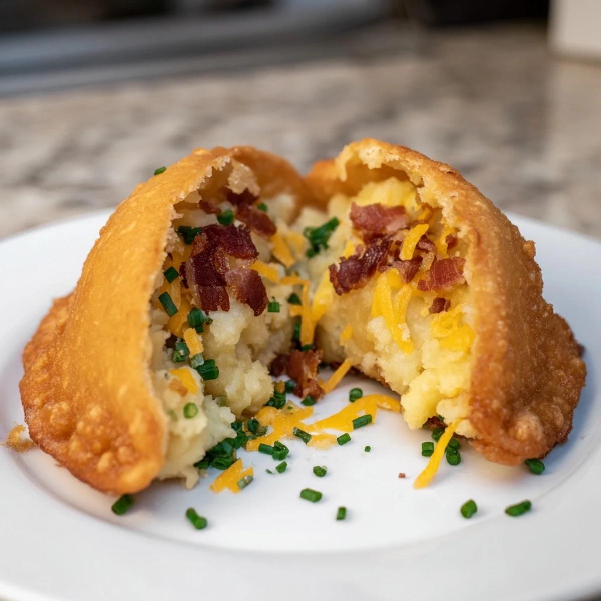 Perfectly cooked Loaded Baked Potato Soup Dumplings, ready-to-serve with crispy bacon and melted cheese toppings.