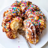 A festive Funfetti coffee cake monkey bread bursting with cinnamon and rainbow sprinkles.  