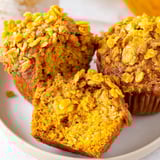Warm, moist pumpkin muffins paired with crispy cornflakes, perfect for breakfast.  