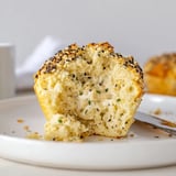 Warm, golden muffins with a creamy cheese center, perfect for breakfast or brunch.  