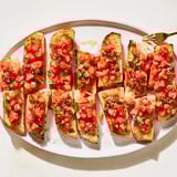 Enjoy a visually appealing diagonal line of Bruschetta Toasts, ready for a delightful appetizer.