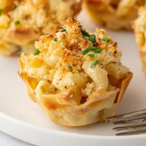 Golden Mac and Cheese Crispy Wonton Cups, a delightful, crunchy, cheesy baked appetizer.