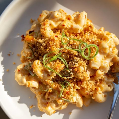 Creamy Spicy Kimchi Mac & Cheese topped with crispy panko and sesame seeds.  