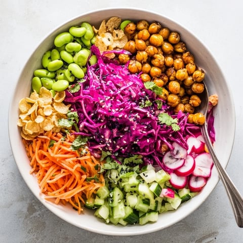 Vibrant ASMR Crunch Snack Bowls filled with colorful vegetables and crunchy toppings.  