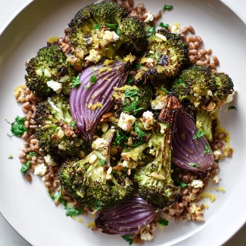 Warm roasted broccoli with a garlic-lemon dressing served over fluffy farro; Mediterranean-inspired deliciousness.