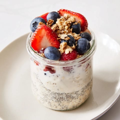 A close-up of colorful Overnight Oats in Jars, ready to eat for a quick breakfast.