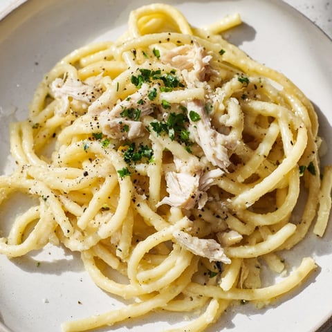 Golden, buttery Simple Garlic Butter Bucatini with tender chicken, ready for a satisfying Italian-inspired dinner.