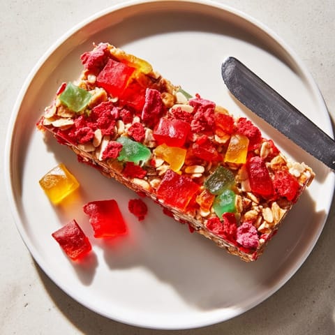 Delicious, chewy DIY snack bars with vibrant homemade gummies and crispy toppings.  