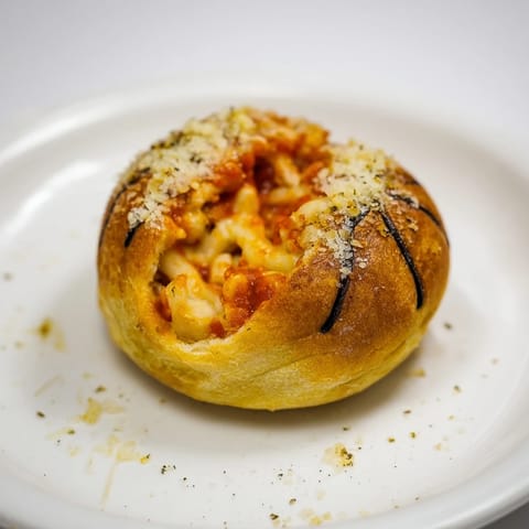 A close-up shot of delicious, cheesy Slam Dunk Basketball Pizza Bites, perfectly bite-sized and fun.