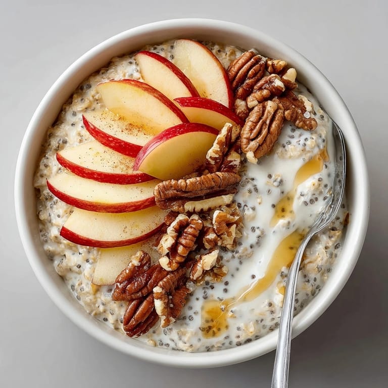 Delicious Apple Cinnamon Overnight Oats, layered with fresh apples and a touch of cinnamon for your morning.