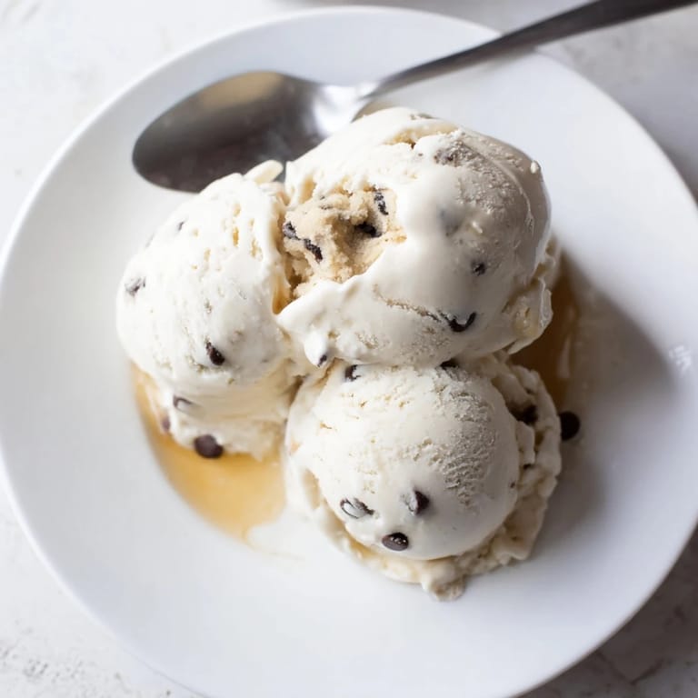 Deliciously smooth cottage cheese ice cream sprinkled with mini cookie dough bites.