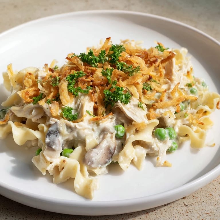 Creamy, bubbly Tuna Noodle Casserole fresh from the oven, ready to serve and enjoy.