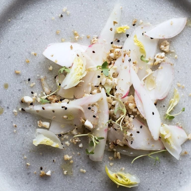 This stunning "Tundra Trek" presents a minimalist vegetarian dish, ready to be enjoyed!