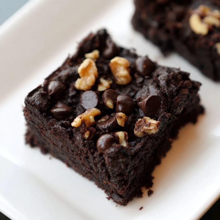 Warm, gooey black bean brownies, the perfect gluten-free dessert made with dark cocoa.